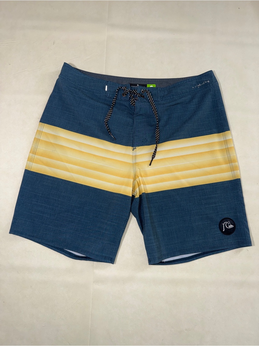 Quiksilver Men's Blue Board Shorts with Yellow Band